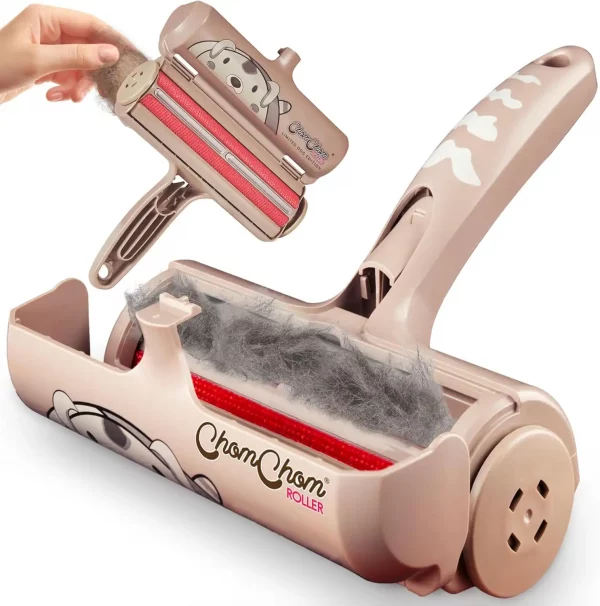 Product detail shot showing the roller with the waste door open, revealing a chamber full of collected grey fur and the internal red brush mechanism.